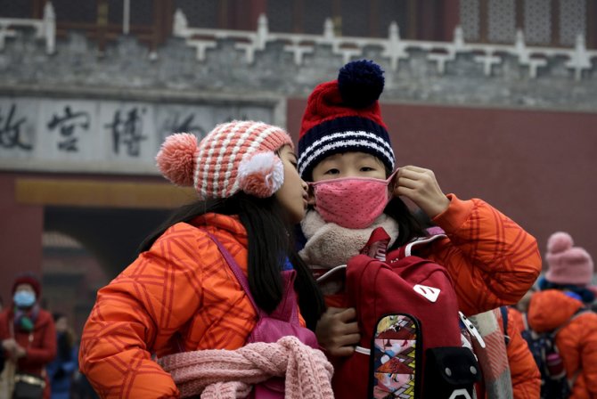 Deca u Pekingu. Foto: Tanjug/AP/Andy Wong