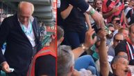 Predsednik Ajntrahta na tribinama davao pare navijačima za pivo (VIDEO)