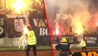 Derby's most terrifying moment: A lit torch from south hits steward directly in the face! (VIDEO)