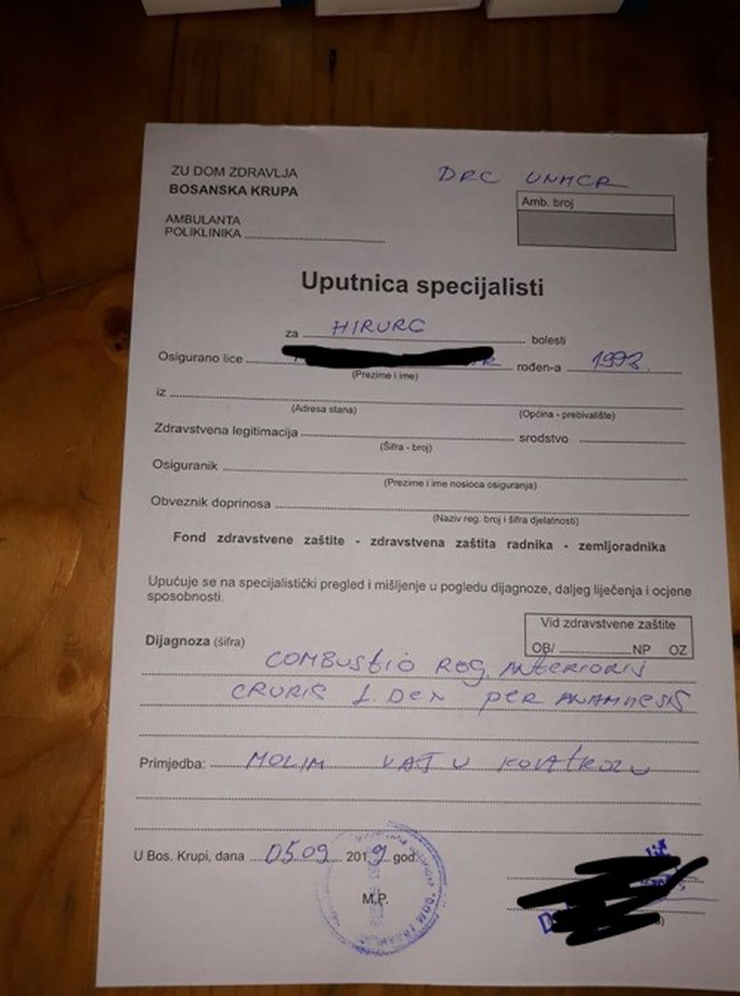 Migrant sa spaljenom nogom Migrant sa spaljenom nogom