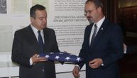 Dacic and Godfrey lay the US flag raised along with the Serbian above the White House 100 years ago