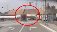 Aggressive trucker rips out railroad crossing gate in Pancevo and just drives off