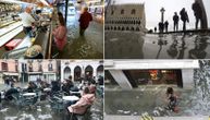 Turisti hrle u Veneciju iako je potop: Sede u kafićima i obilaze brendirane butike u vodi do kolena