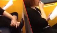 Nije za one sa slabim želucem: Žena je čitala knjigu u metrou i onda je pojela nešto odvratno