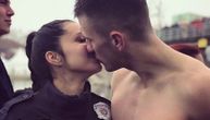 Prelepa policajka Teodora poljubila je Miloša, zgodnog momka koji se upravo borio za časni krst