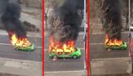 Taksi u plamenu mili po Nišu, iznad njega kulja crn dim: Pojavio se snimak zapaljenog automobila