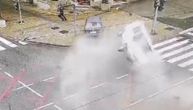 Disturbing video of crash that killed 3: BMW smashes into van, then into Serbian government building