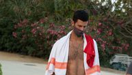 Paparazzi photograph Djokovic in Marbella: Barefoot, wearing a wooden cross, and an unusual mask