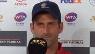 Novak je samo klimao glavom uz osmeh dok je slušao pitanje o rušenju dva velika rekorda Federera