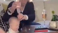 Baba je morala brzo da odabere da li će da sačuva bebu ili čašu šampanjca: Snimak je video ceo svet