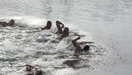 I Srbi sa Floride plivali za Časni krst: Među 15 takmičara i jedna devojka