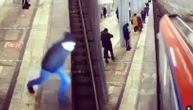 Uznemirujući snimak pokušaja samoubistva u Moskvi: Skočio pod voz, niko se nije pomerio