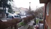 Ponovo neobične padavine u Beogradu: Pljusak snega i sugradice, nebo mrke boje, oluci odzvanjaju