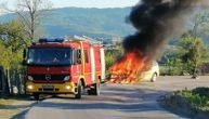 Fireball on the road in Vranici: Moving car catches on fire, firefighters try to put it out