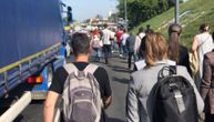 Belgrade traffic chaos in one picture: People walk to work along highway, giving up on transport