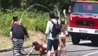 Ukrainian women fined for stripping naked and spraying each other with a hose on road in Montenegro