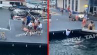 Makljali se pred decom, stali tek kad ih je rmpalija pobacao u vodu: Tuča zbog parkinga ali za čamce