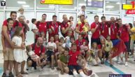Zlatni olimpijci stigli u Beograd: Vaterpolisti pevali "A sad adio", Jovani klicali na aerodromu