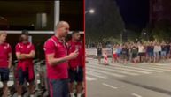 Red Star fans show up in early hours to lift spirits of their players after shock UCL elimination