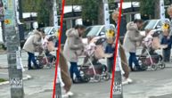 Jeziv snimak iz Novog Sada: Žena šamara bebu u kolicima nasred ulice