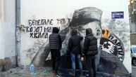 Ratko Mladic mural destroyed again, this time with black paint: A group of youths clean it up again