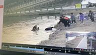 Pomagali mu sa obale a ključan je bio jedan predmet: Hrabar policajac spasao dete iz ledene reke