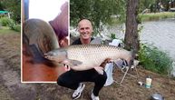 Petar je ulovio "džina" u jezeru u Nemačkoj: O njegovoj ljubavi prema ribolovu svedoči tetovaža na ramenu