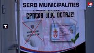 Messages reading, "Welcome to Community of Serb Municipalities," displayed in northern Kosovo and Metohija