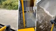 Torrent bursts inside city bus in Belgrade: Passengers lift their feet and watch water swirl around them