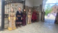 Ana Brnabic welcomed at monastery in Kosovo by members of KUD Kopaonik wearing beautiful medieval costumes