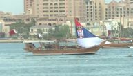 The Serbian boat in bay in Qatar proudly spread its sails, on the way towards World Cup's Round of 16