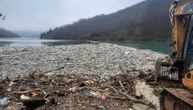 Plastic floats on a river, guess which? Thousands of cubic meters of waste, cleaning continues after holidays