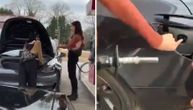 Neverovatan video ili samo nameštaljka: Devojka pokušala da napuni Teslu na benzinskoj pumpi