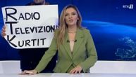 Chaos on so-called Kosovo's broadcaster: Activist charges into studio with "Radio Television Kurti" placard