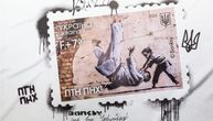Ukrajina štampala markice sa Benksijevim muralom povodom godišnjice početka rata