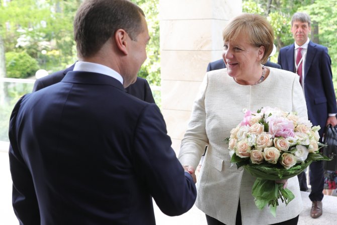 Vladimir Putin, Angela Merkel