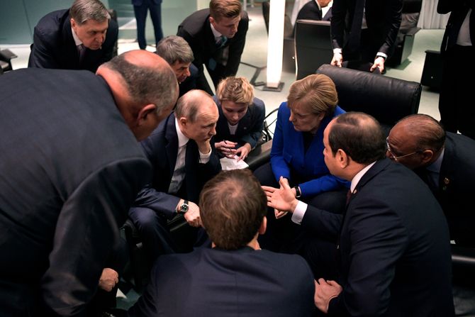 Putin Merkel