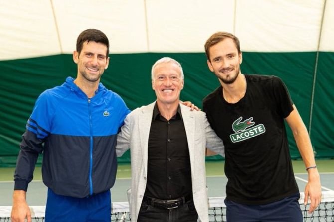 Novak Đoković, Danil Medvedev, Didije Dešamp Novak Đoković, Danil Medvedev, Didije Dešamp