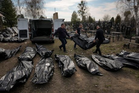 Buča Ukrajina rat tela masovna grobnica