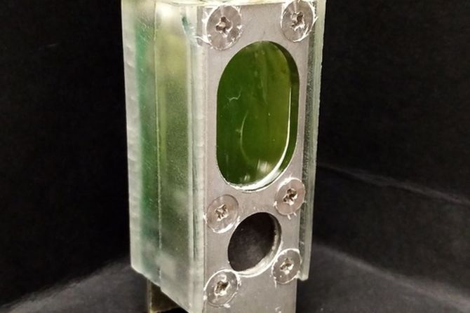 This system, containing blue-green algae, powered a microprocessor continuously for a year using nothing but ambient light and water