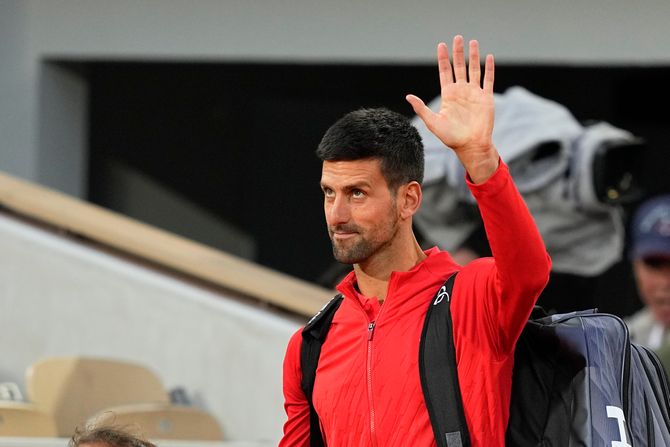 Novak Đoković, Rolan Garos, Jošihito Nišioka Novak Đoković, Rolan Garos, Jošihito Nišioka