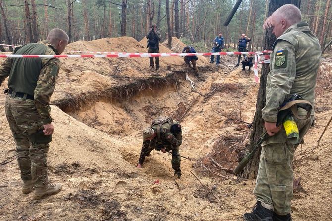 Ukrajina Izjum Izyum masovna grobnica