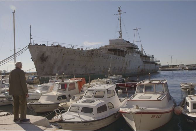 Stevan Labudović by President Tito’s ship “Galeb” in the port of Rijeka, Croatia. Starting in 1954, he sailed with the President on ‘Voyages of Peace’ to 18 countries on three continents_Photo Credit Poppy