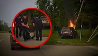 Automobil se zakucao u stub i zapalio: Vozača iz buktinje izvukli policajci, pogledajte dramu
