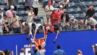 Fan gives Novak North Macedonia flag to sign, and afterwards shows how much he loves Djokovic