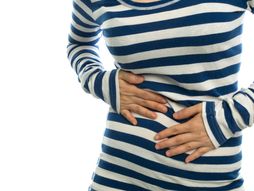 Žena, bol u stomaku