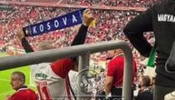 Fan provokes Serbs by holding up scarf of so-called Kosovo, and then Hungarian security teaches him a lesson