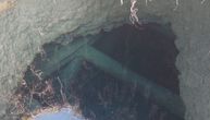 Deep black sinkhole filled with water in western Serbia: Locals are afraid, and it's known why it appeared