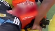 Novi snimak užasa na Marakani: Navijaču rascepana glava, on u bolovima jauče dok ga iznose sa terena