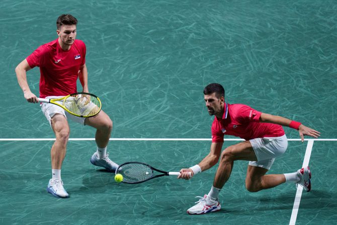 Miomir Kecmanović i Novak Đoković Miomir Kecmanović i Novak Đoković